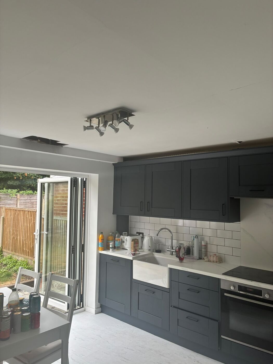 Grey kitchen with the ceiling made good after PureFlo traced and repaired a hidden leak